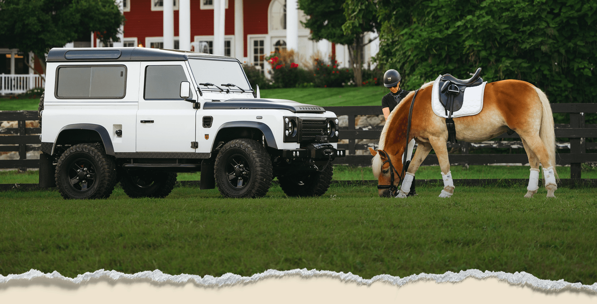 Land Rover and horse on a Traverse City estate